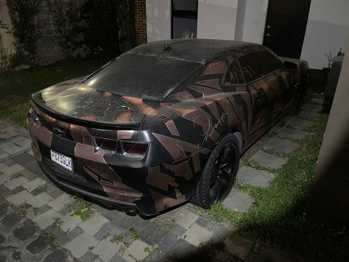 El automóvil marca Chevrolet, Camaro, fue localizado en Ciudad Vieja, Sacatepéquez. (Foto: PNC)