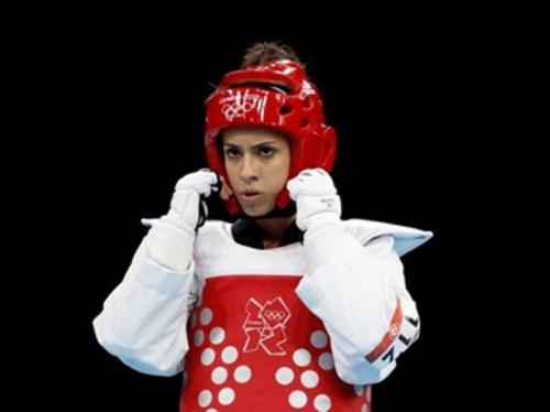 En los Juegos Centroamericanos 2013, "Ely" encabezó a la delegación guatemalteca como abanderada en el primer evento del ciclo olímpico para Río de Janeiro 2016. (Foto COG)