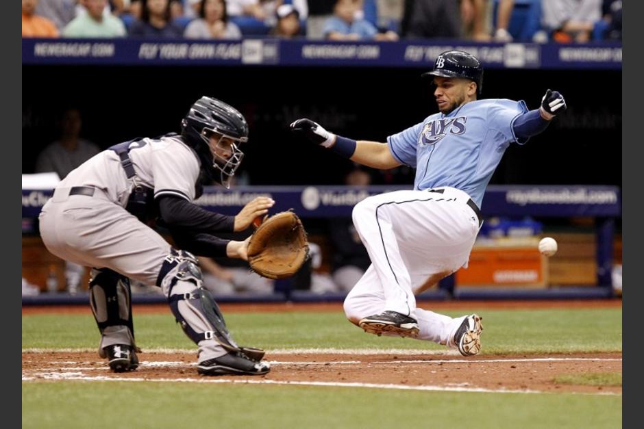 Fue hasta el decimo segundo episodio que los Yanquis pudieron romper la paridad ante los Rays. (Foto: AFP)