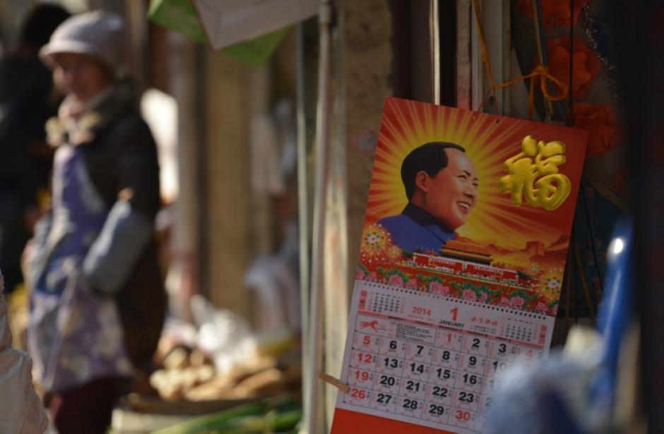La instancia legislativa más alta de China adoptó unas mociones que formalizan la abolición de los campos de reeducación por el trabajo y flexibilizan la política de control de nacimientos. (AFP)