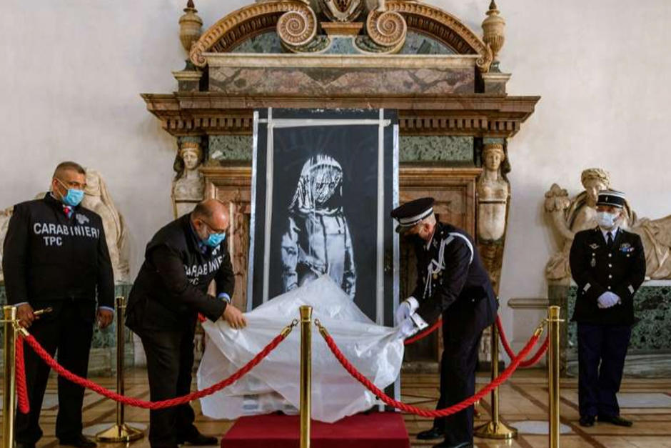 La puerta de "La niña triste" fue devuelta a Francia por las autoridades italianas (Fotografía: El Clarín)