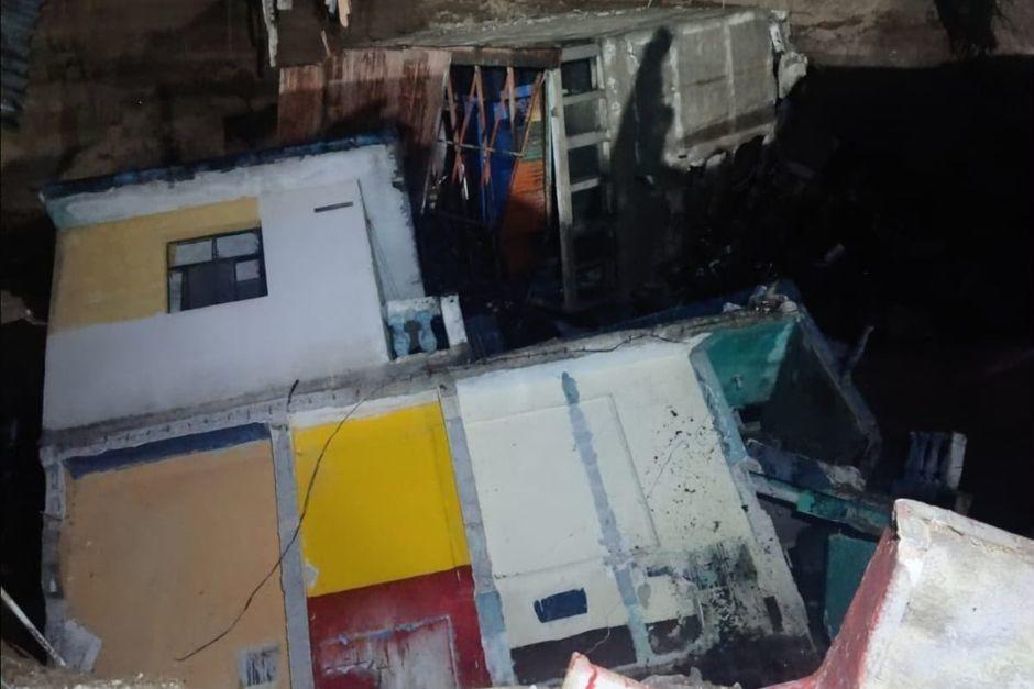 El colapso de otra vivienda ocurrió durante la noche del pasado martes tras fuertes lluvias. (Foto: Conred)