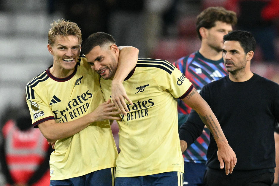 Odegaard y Guimaraes celebrando el triunfo de los gunners a domicilio. (Foto: AFP) 