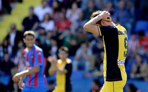 David Villa se lamenta tras el final del juego