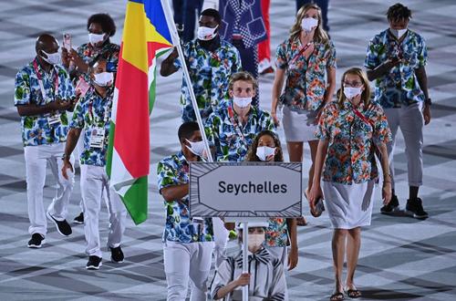 La delegación de Seychelles durante su recorrido en su presentación. (foto: AFP)