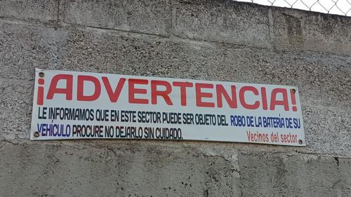 robo de baterías, quetzaltenango, advertencia en cartel