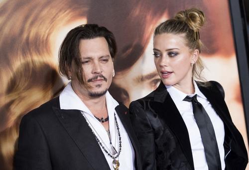 Johnny Depp y Amber Heard se enfrentaron en un juicio tras varios años de relación sentimental. (Foto: AFP)