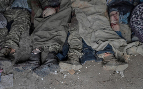 Cadáveres de civiles y soldados en una morgue en Mykolaiv, una ciudad ucraniana a orillas del Mar Negro que ha estado bajo ataque ruso durante días, el 11 de marzo de 2022. (Foto: AFP)
