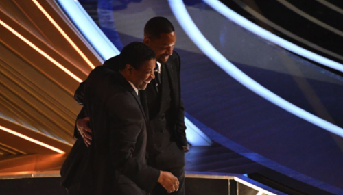 Will Smith fue calmado por Denzel Washington. (Foto: AFP) 