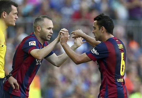 Dupla hist&oacute;rica, Xavi Hern&aacute;ndez y Andr&eacute;s Iniesta. (Foto: EFE)