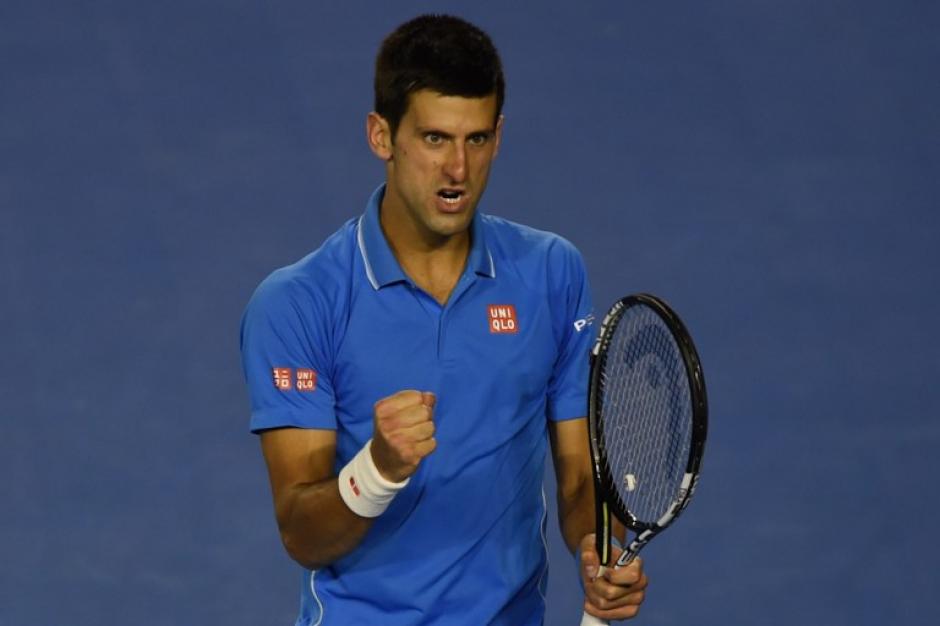 El serbio Novak Djokovic celebra su triunfo en la final del Abierto de Australia, frente a Andry Murray. (Foto: Manan Vaysyayana/AFP)