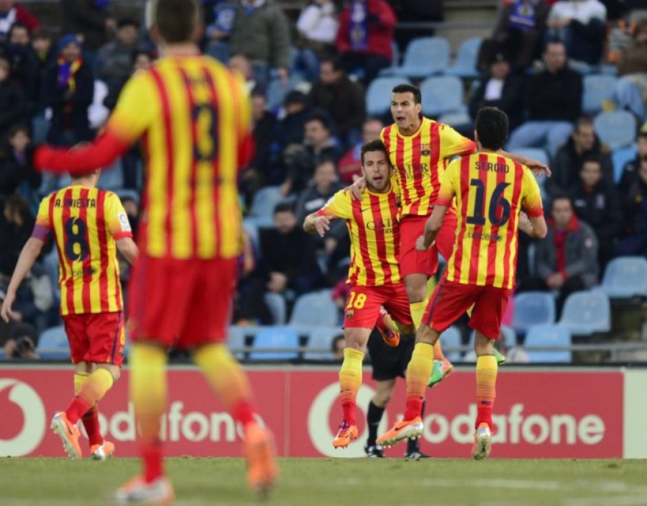 Pedro Rodr&iacute;guez festeja al marcar triplete frente al Getafe y darle al FC Barcelona un triunfo importante. (AFP)
