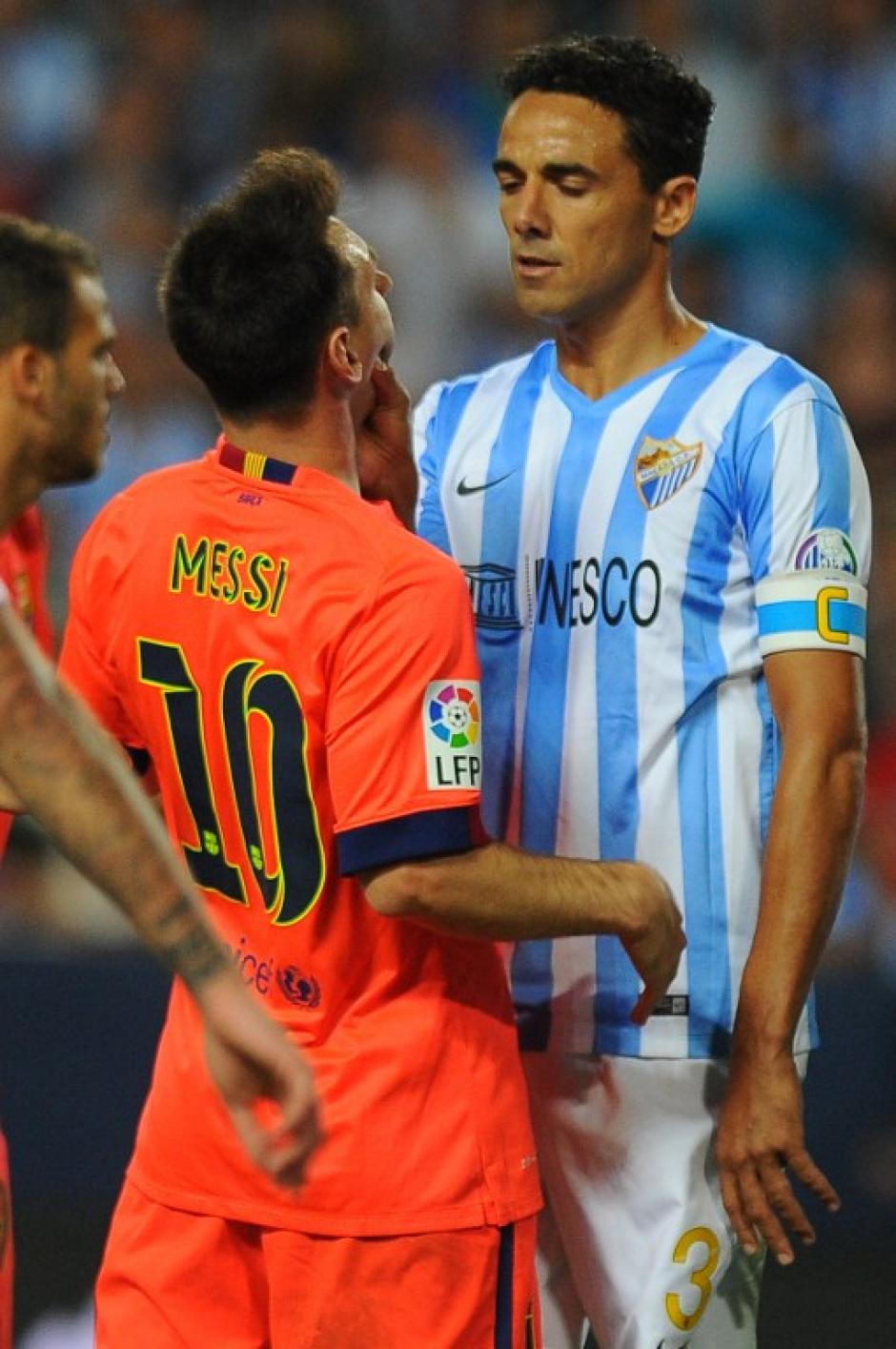 El defensor brasile&ntilde;o Welligton tuvo un cruce con Lionel Messi en el empate entre el M&aacute;laga y Barcelona. (Foto: AFP)