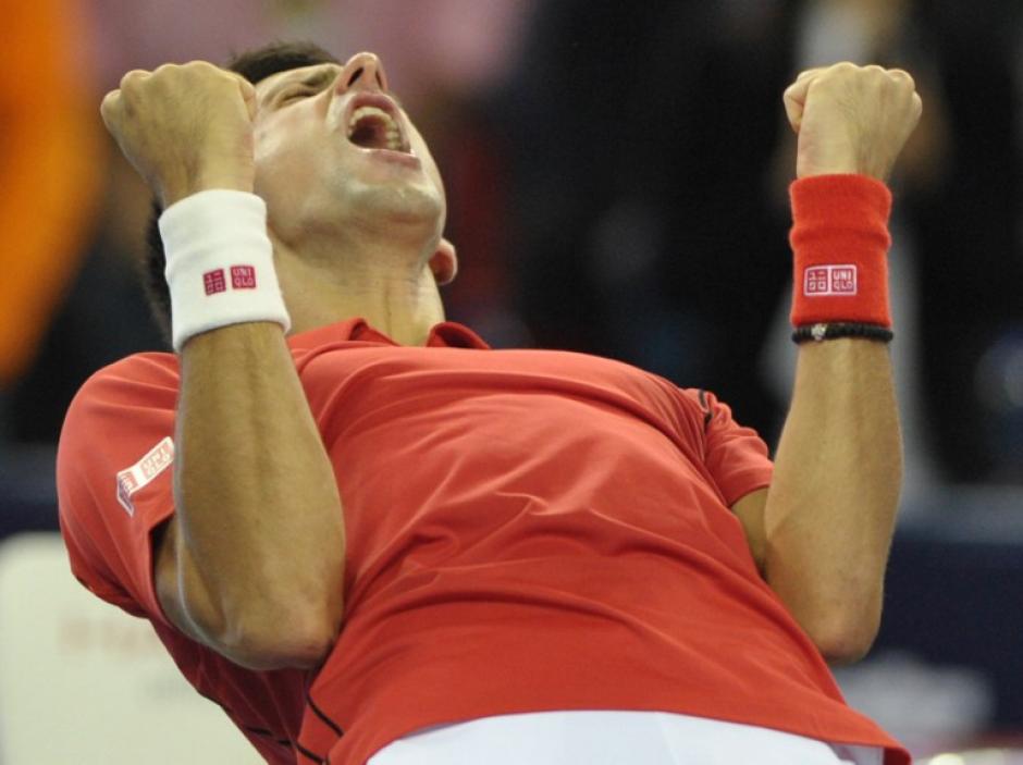 Novak Djokovic festeje euf&oacute;rico en el duelo contra Jo-Wilfried Tsonga. (Petre Parks/AFP)