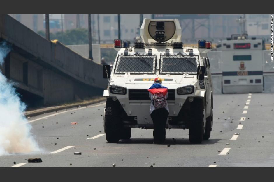 Esta fotografía captada en Venezuela le ha dado la vuelta al mundo. (Foto: Juan Barreto/AFP)