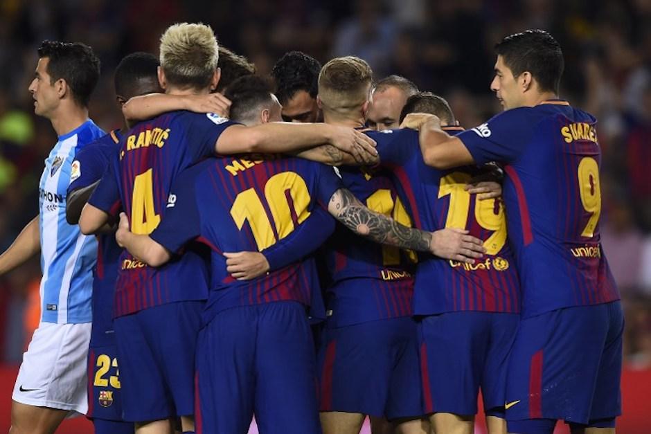 Jugadores del equipo azulgrana celebran una anotación frente al Málaga CF en juego de La Liga del pasado 21 de octubre.&nbsp;(Foto: AFP)