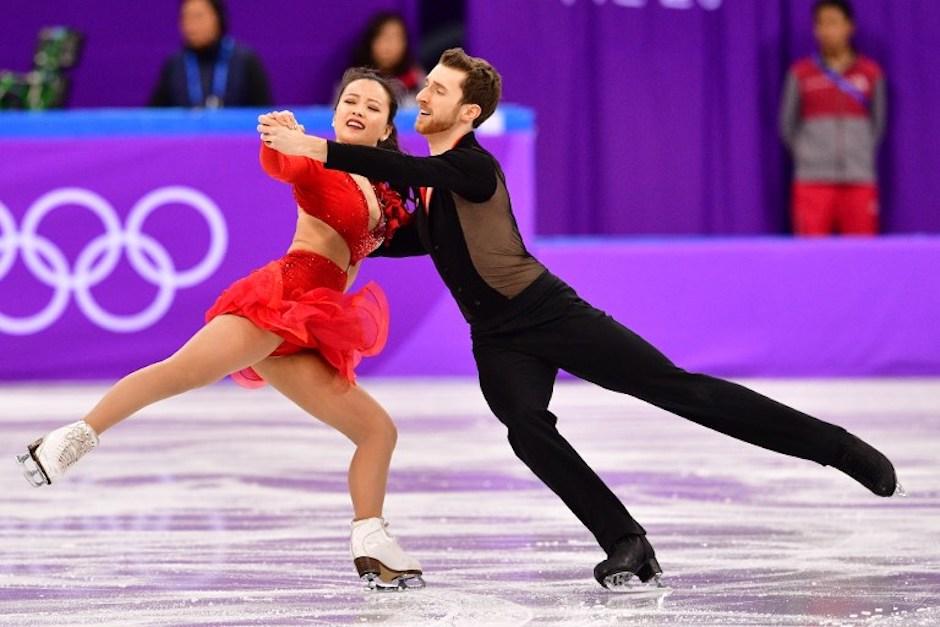Yura Min y Alexander Gamelin, los representantes de Corea del Sur, fueron los primeros en patinar con los sonidos latinoamericanos.&nbsp;(Foto: AFP)