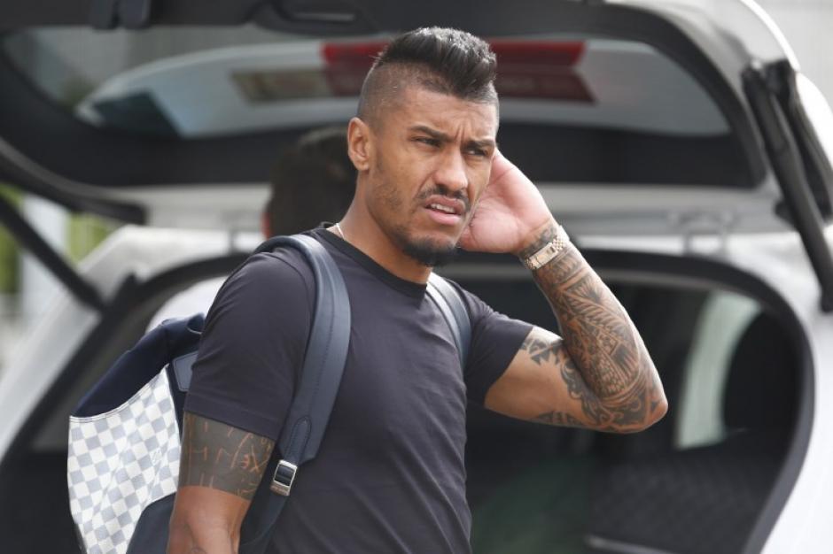 Paulinho se qued&oacute; en Europa, tras la eliminaci&oacute;n de Brasil del Mundial, para definir su futuro futbol&iacute;stico. (Foto: AFP)