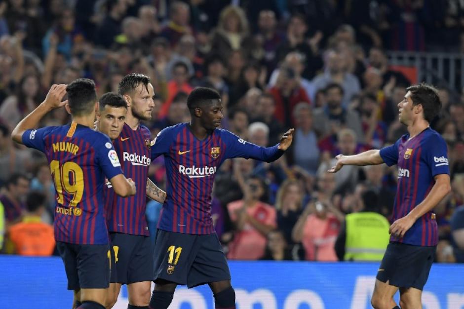 Barcelona festeja el triunfo ante el Sevilla. (Foto: AFP)