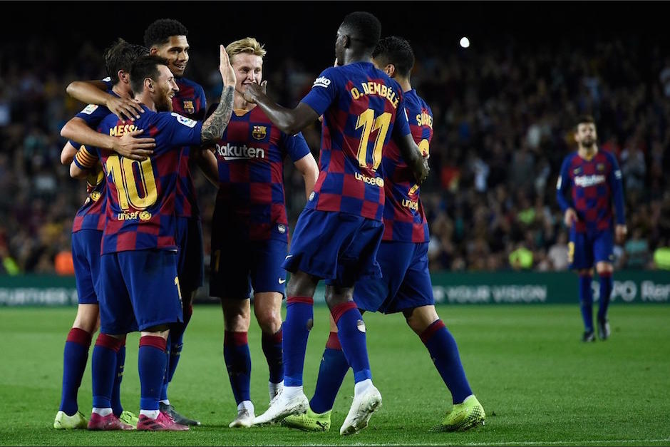 El Barcelona venci&oacute; al Sevilla y sigue cerca del liderato. (Foto: AFP)