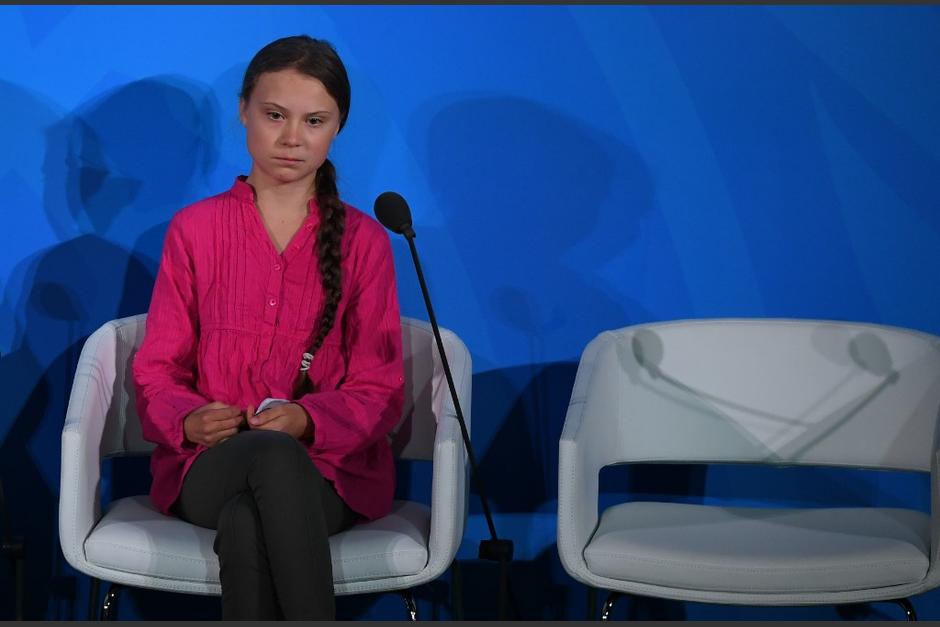 La ambientalista no pudo ocultar su molestia al ver a Donald Trump en el evento. (Foto: AFP)