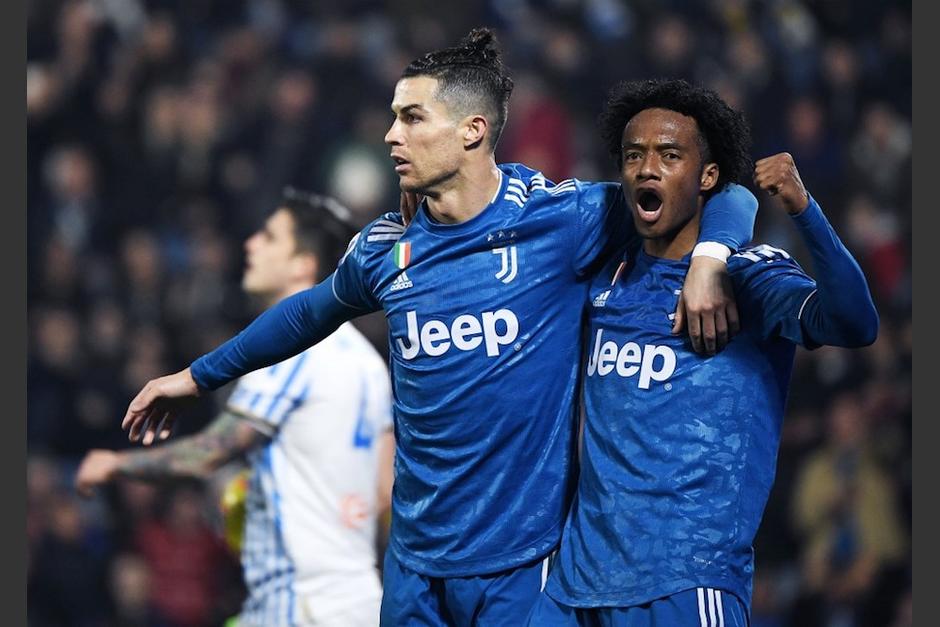 Cristiano Ronaldo y Juan Cuadrado festejan la anotaci&oacute;n del portugu&eacute;s. (Foto: AFP)