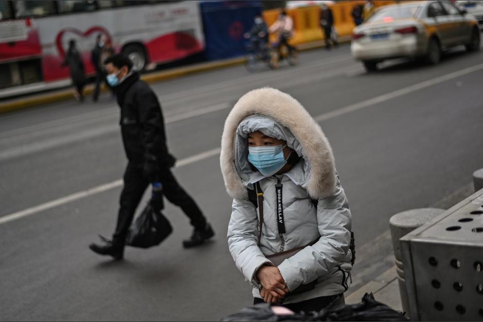 Una misi&oacute;n de la OMS sigue en el pa&iacute;s indagando sobre el inicio del Covid-19. (Foto: AFP)&nbsp;