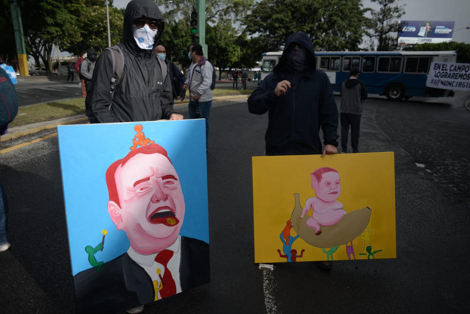Dos manifestantes llevaron su arte visual a las calles. (Foto: Wilder López/Soy502)
