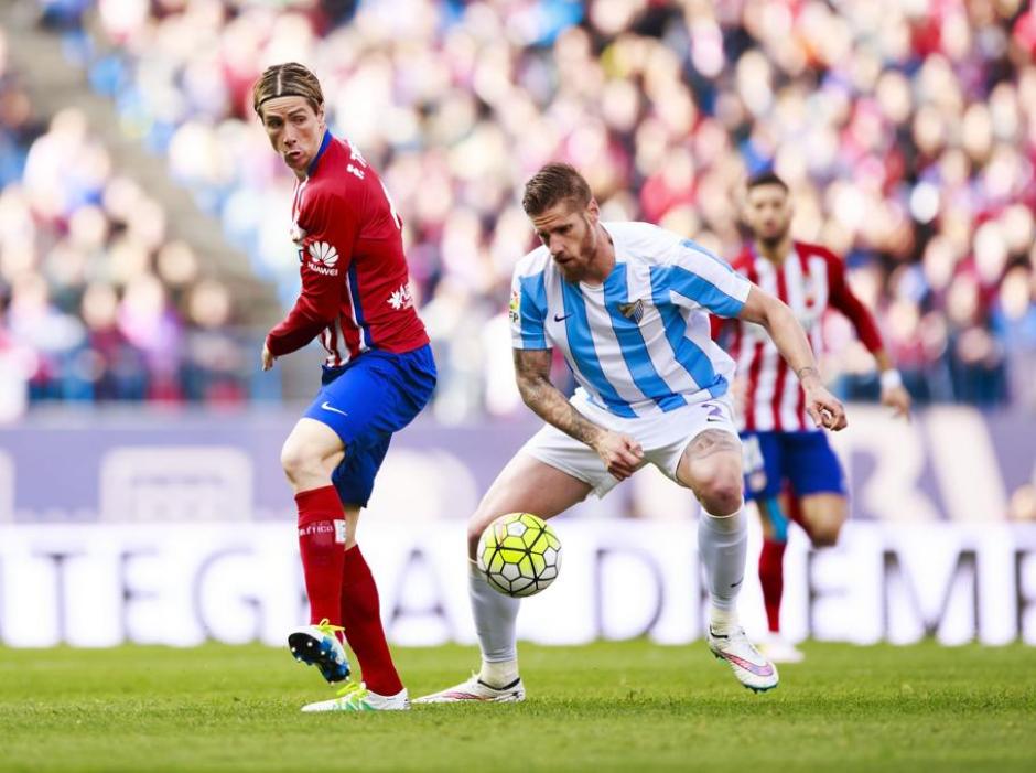 Torres vio la amarilla, mientras Simeone fue expulsado del juego. (Foto: AFP)