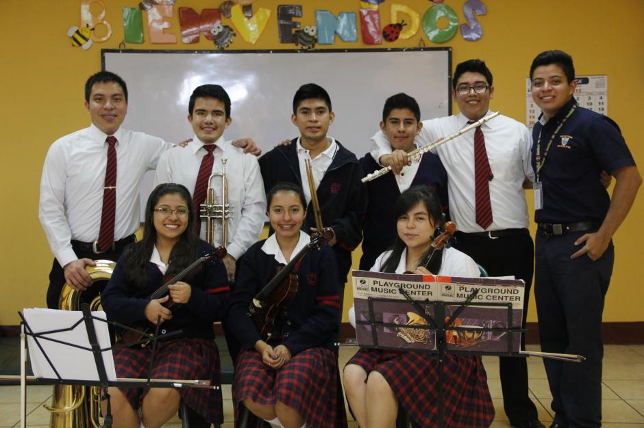 Los integrantes de la orquesta sinf&oacute;nica La Patria fusionar&aacute;n su talento con otras orquestas en el primer festival intercolegial a celebrarse el 14 de agosto en el Conservatorio Nacional de M&uacute;sica. (Foto: Fredy Hern&aacute;ndez/Soy502)