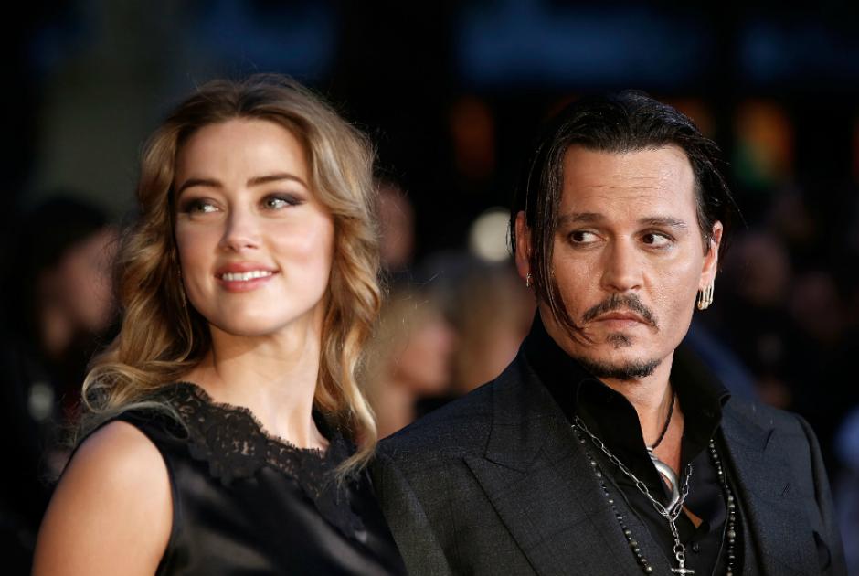 La actriz estadounidense, Amber Heard junto con su marido Johnny Depp. (Foto: laopinion.com)