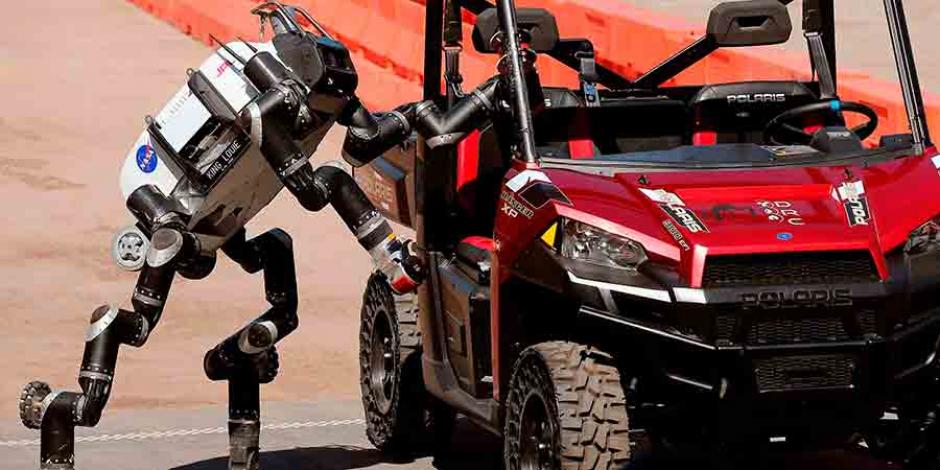 En la competencia participan 24 robots con forma humana, acompa&ntilde;ados de sus equipos, 12 de EE.UU., cinco de Jap&oacute;n, tres de Corea del Sur, dos de Alemania, Italia y China. (Foto: AFP)&nbsp;