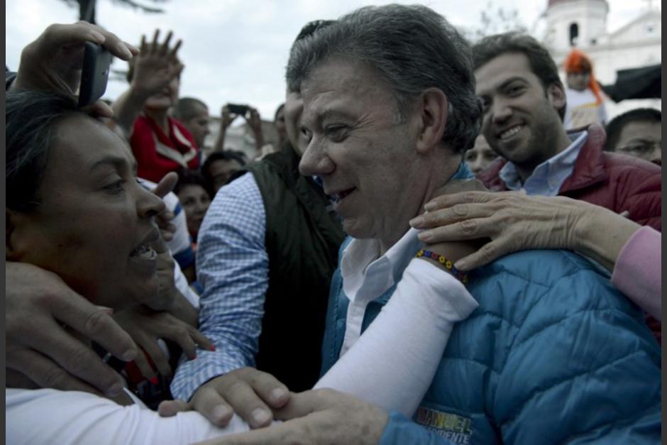 Juan Manuel Santos, actual presidente de Colombia se perfila como el virtual ganador de la segunda vuelta electoral y se prev&eacute; que su mandato se prolongue otros cuatro a&ntilde;os m&aacute;s. (Foto: AFP)