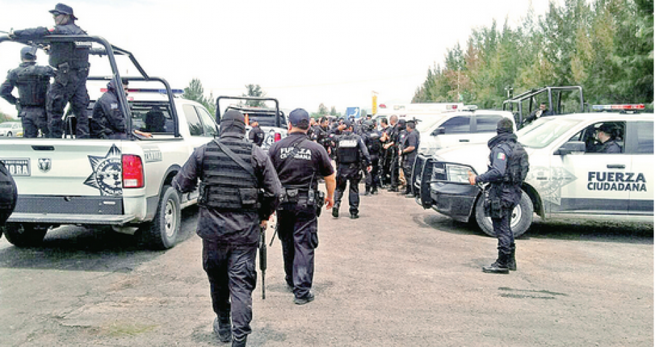 Polic&iacute;as federales se enfrentaron contra miembros de un c&aacute;rtel del narcotr&aacute;fico en Tanhuato, Michoac&aacute;n, M&eacute;xico, dejando como saldo 43 muertos. (Foto: El Excelsior)&nbsp;
