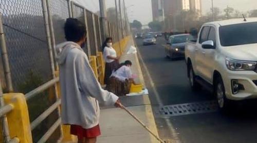 Vecinos de asentamientos piden comida en El Naranjo