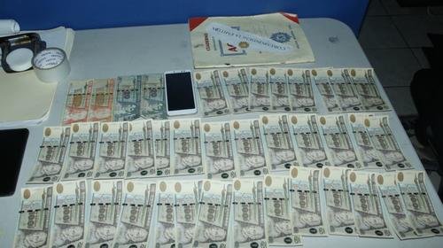 Hermanos capturados con Q7,400 en billetes falsos